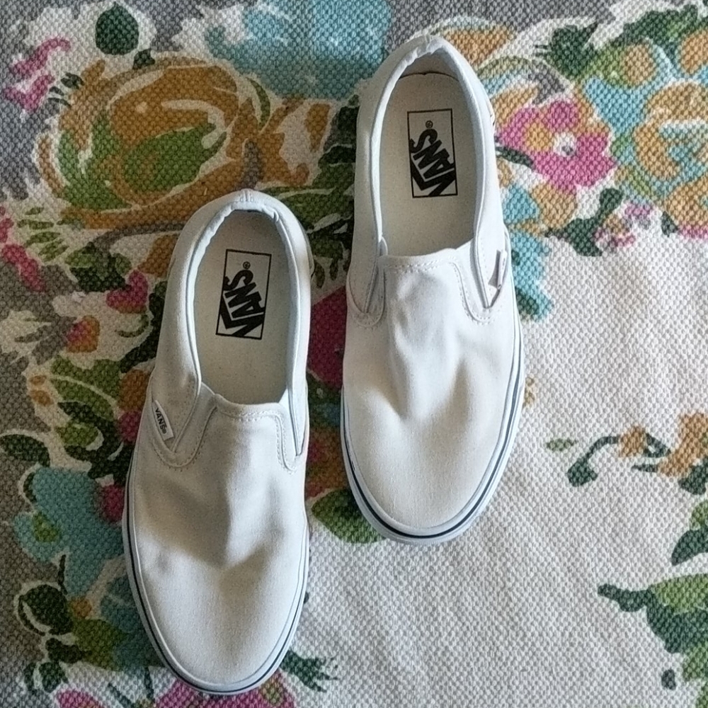 Cream Vans slip-ons. Worn once, like new.